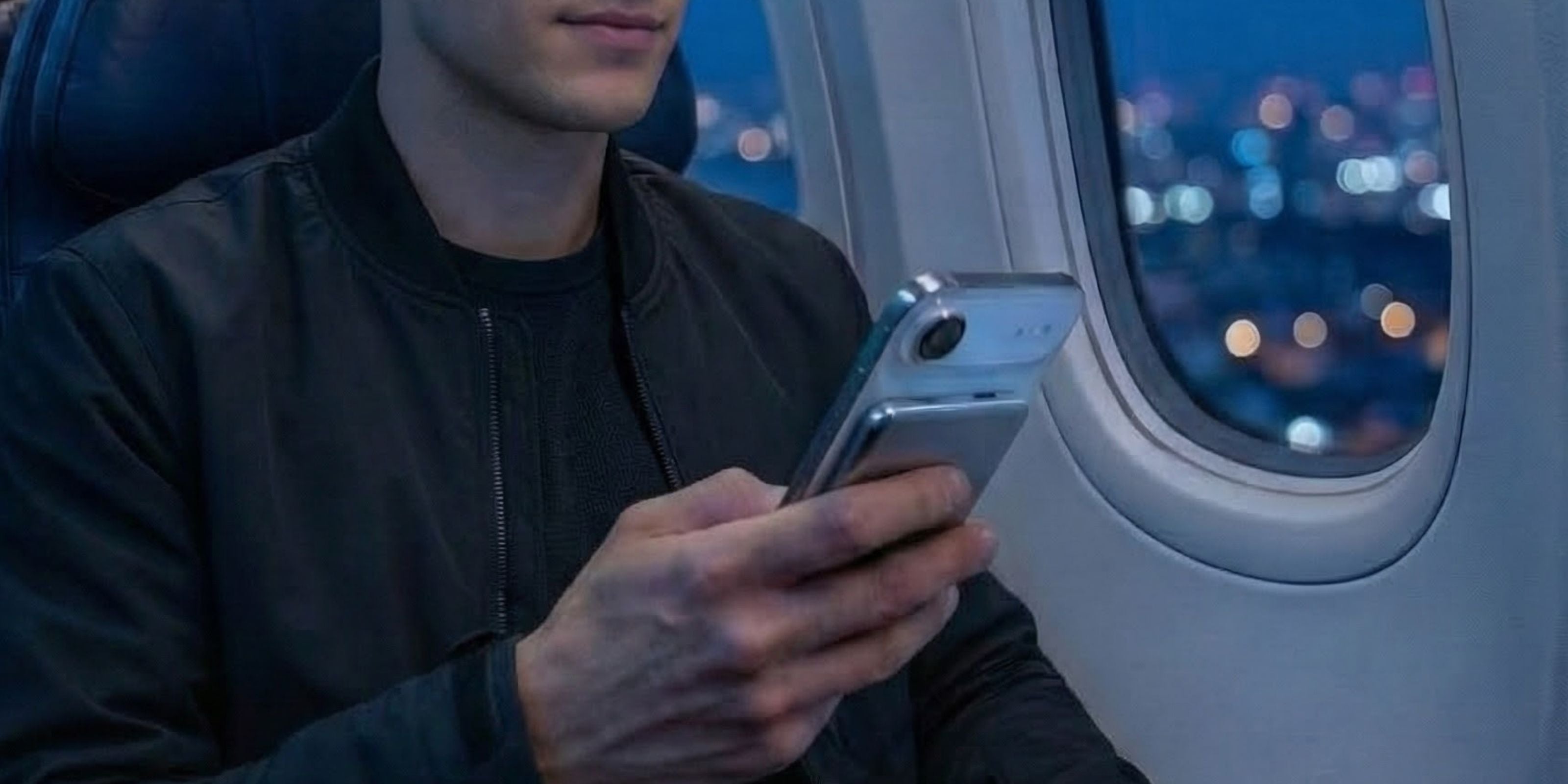 Power bank beside an airline boarding pass, illustrating FAA carry-on rules