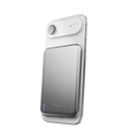 BMX SolidSafe™ Air 5K silver magnetic power bank attached to a smartphone