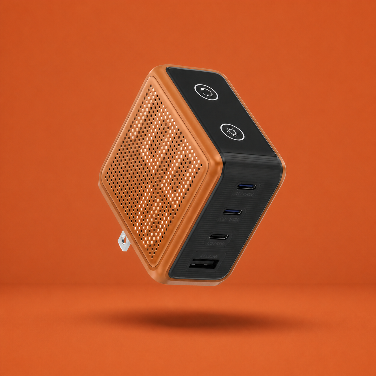 Orange GaNSta 100W Pixel charger floating against a flat burnt-orange studio background